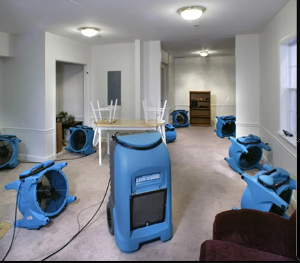 Air movers and dehumidifier setup for Water Damage Restoration in Marietta